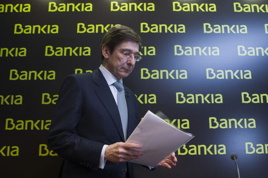 **FILE** Bankia president Jose Ignacio Goirigolzarri arrives May 26, 2012, for a press conference at the bank's headquarters in Madrid. (Associated Press)