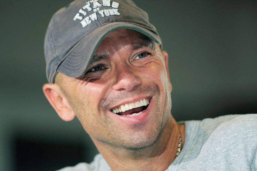 Kenny Chesney will collaberate with Oscar-winning director Jonathan Demme on the "American Express Unstaged" music series June 20. (Associated Press)