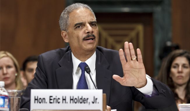 Attorney General Eric Holder testifies June 12, 2012, on Capitol Hill before a Senate Judiciary Committee hearing looking into national security leaks. (Associated Press)