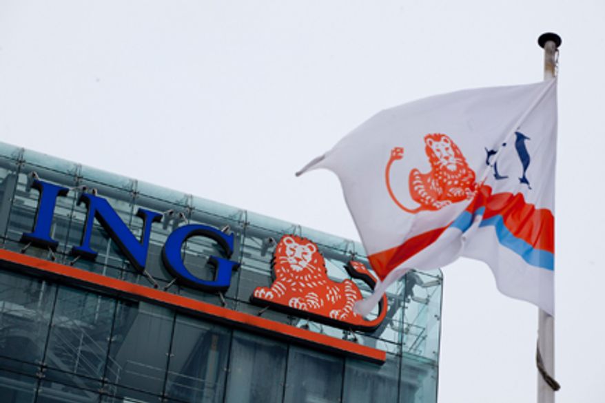 **FILE** A branded flag flies outside the ING head office in Amsterdam on Feb. 9, 2012. (Associated Press)