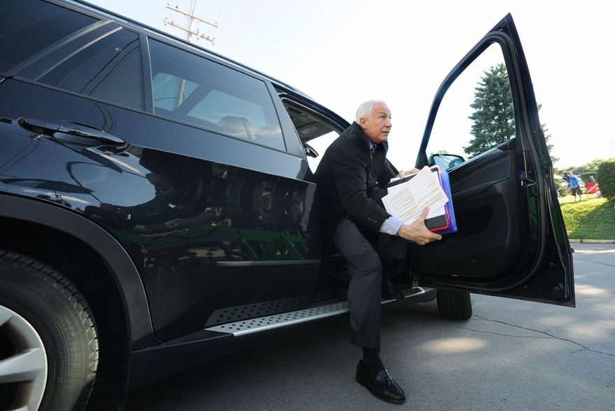 Former Penn State University assistant football coach Jerry Sandusky arrives for the third day of his trial at the Centre County Courthouse in Bellefonte, Pa., on Wednesday. (Associated Press)