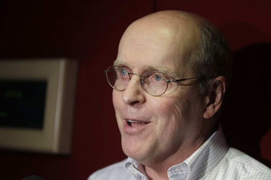 Bowl Championship Series Director Bill Hancock speaks during a news conference after a meeting of the BCS Commissioners on Wednesday, June 13, 2012, in Chicago as they try to decide on a new format for the BCS series. Hancock said the group continues to make progress in the discussion of the future of college football's post-season. (AP Photo/M. Spencer Green)