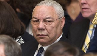 ** FILE ** Former Secretary of State Colin Powell attends the unveiling of the official portraits of former President George W. Bush and former first lady Laura Bush in the East Room of the White House in Washington on Thursday, May 31, 2012. (AP Photo/Pablo Martinez Monsivais)