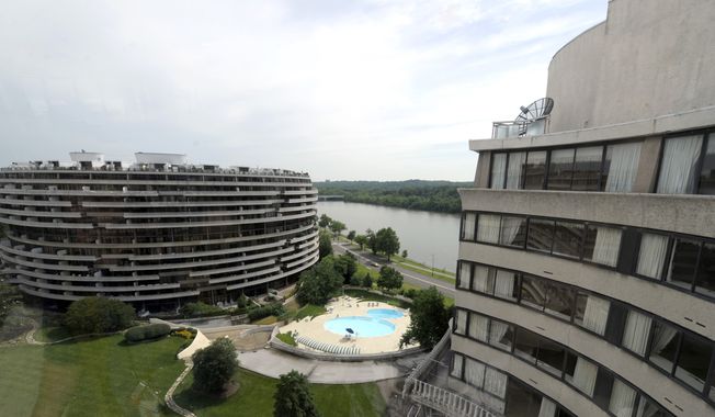 This photo taken May 30, 2012 shows a view of the Watergate complex from the top floor of the Watergate Office Building in Washington. Forty years ago police in Washington arrested five men breaking in to the Democratic National Committee offices. The name of the complex they were breaking into became infamous: the Watergate. These days, though, unless you know where to look, there’s little marking the location of the 1972 crime that ultimately led to the resignation of President Nixon. (AP Photo/Susan Walsh)