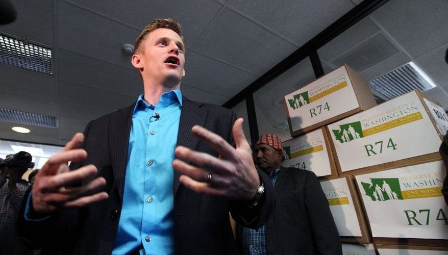 Joseph Backholm, the chairman of Preserve Marriage Washington, speaks out in Olympia, Wash., on June 6 for preserving the traditional definition of marriage. Washington is one of four states that will vote on the subject in November. (Associated Press)