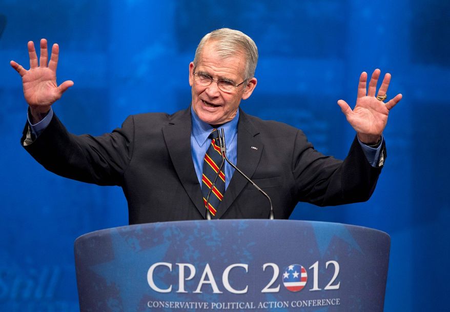 Retired Marine Lt. Col. Oliver North addressed the Conservative Political Action Conference in Washington in February. He has become a visible figure in political circles in the years since the Iran-Contra controversy. (Associated Press)