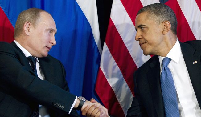 ** FILE ** President Obama meets with Russian President Vladimir Putin  at the G-20 summit in Los Cabos, Mexico. (Associated Press)