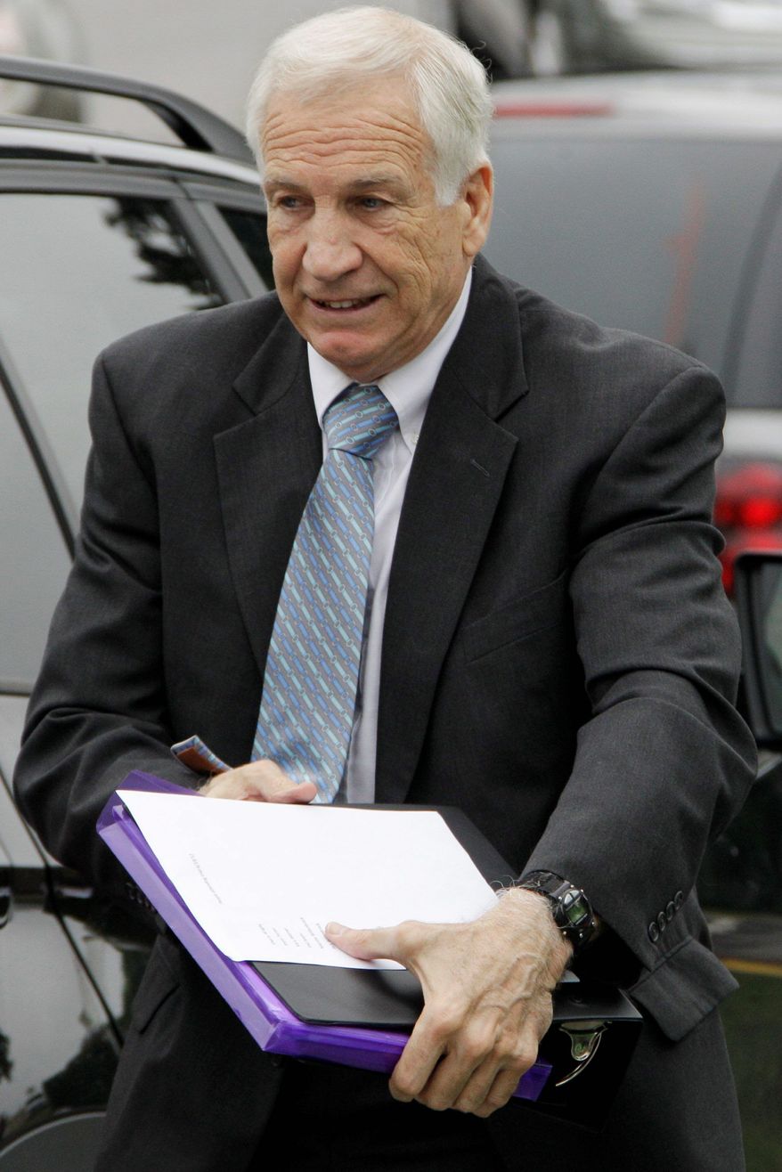 Jerry Sandusky arrives for his trial in Bellfonte, Pa., Tuesday on the day the court heard testimony from his wife, Dottie, who has stood by him since allegations that he had sexual contact with boys broke last year. (Associated Press)