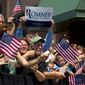 Romney supporters rally in DeWitt, Mich., on Tuesday. Even among the crowds that turned out to hear Mr. Romney, it was evident that this fall&#39;s election will be a referendum on President Obama&#39;s first term. (Associated Press)