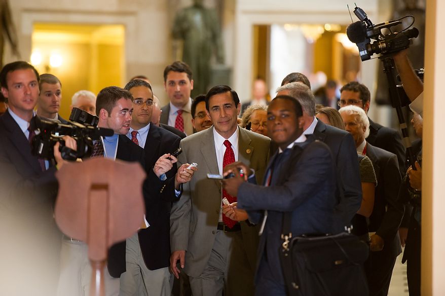 Rep. Darrell E. Issa (center), California Republican and chairman of the House Oversight and Government Reform Committee, comes to speak to the media after meeting with Attorney General Eric H. Holder Jr. at the U.S. Capitol in Washington on Tuesday, June 19, 2012, to discuss the congressional investigation into the botched anti-gunrunning Fast and Furious operation. (Andrew Harnik/The Washington Times)