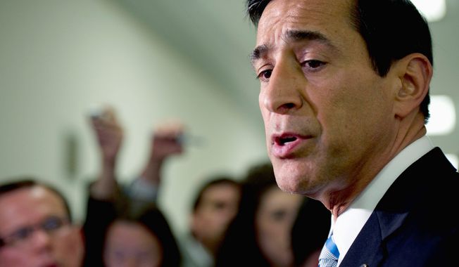 ** FILE ** Rep. Darrell E. Issa tells the media that Attorney General Eric H. Holder Jr. must provide Congress with the requested documents in the &quot;Fast and Furious&quot; probe in this June 20, 2012, file photo. (Barbara L. Salisbury/The Washington Times)