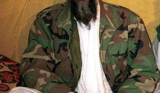 ** FILE ** This is an undated file photo of al Qaeda leader Osama bin Laden in Afghanistan. (AP Photo, File)