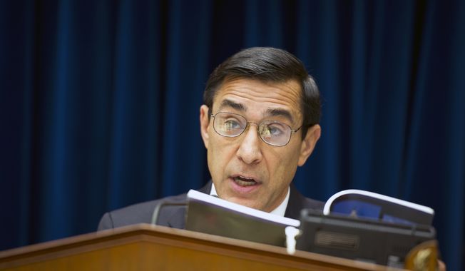 ** FILE ** Rep. Darrell E. Issa, California Republican and chairman of the House Committee on Oversight and Government Reform, reads from a book on June 20, 2012, at the Rayburn House Office Building on Capitol Hill, quoting the president&#x27;s right to assert executive privilege after learning that President Obama has done so in the &quot;Fast and Furious&quot; gun-tracking case, refusing to turn over related documents to Congress. The committee proceeded with its markup to vote on whether to hold Attorney General Eric H. Holder Jr. in contempt for his failure to produce those documents. (Barbara L. Salisbury/The Washington Times)