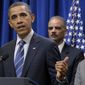 **FILE** President Obama (left) speaks Feb. 9, 2012, in Washington about a settlement with the nation&#39;s five largest banks over foreclosures. Attorney General Eric H. Holder Jr. is in the background. (Associated Press)