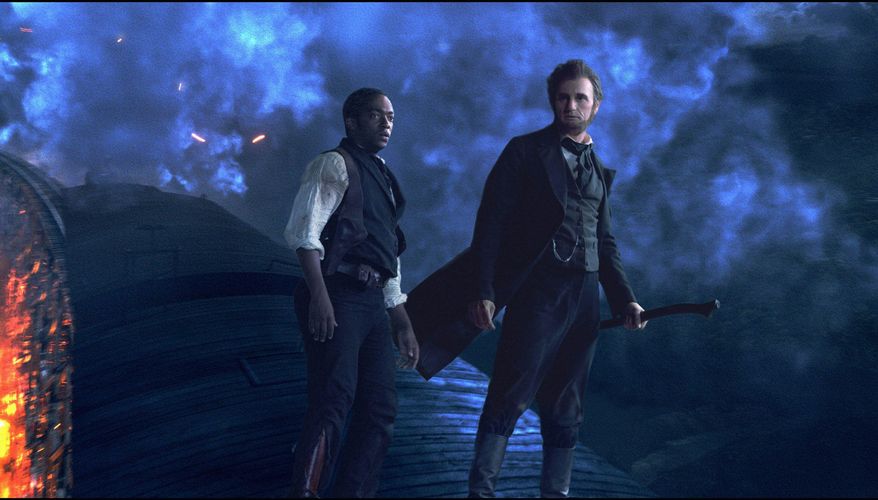 Benjamin Walker stars as the ax-wielding title character in "Abraham Lincoln: Vampire Hunter" while Anthony Mackie plays Lincoln's sidekick, William H. Johnson. (20th Century Fox via Associated Press)