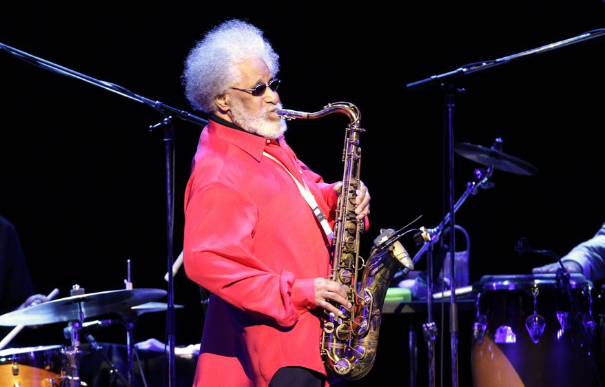 ** FILE ** Jazz saxophonist Sonny Rollins performs during a concert in Tokyo in October 2010. (AP Photo/Junji Kurokawa, File)