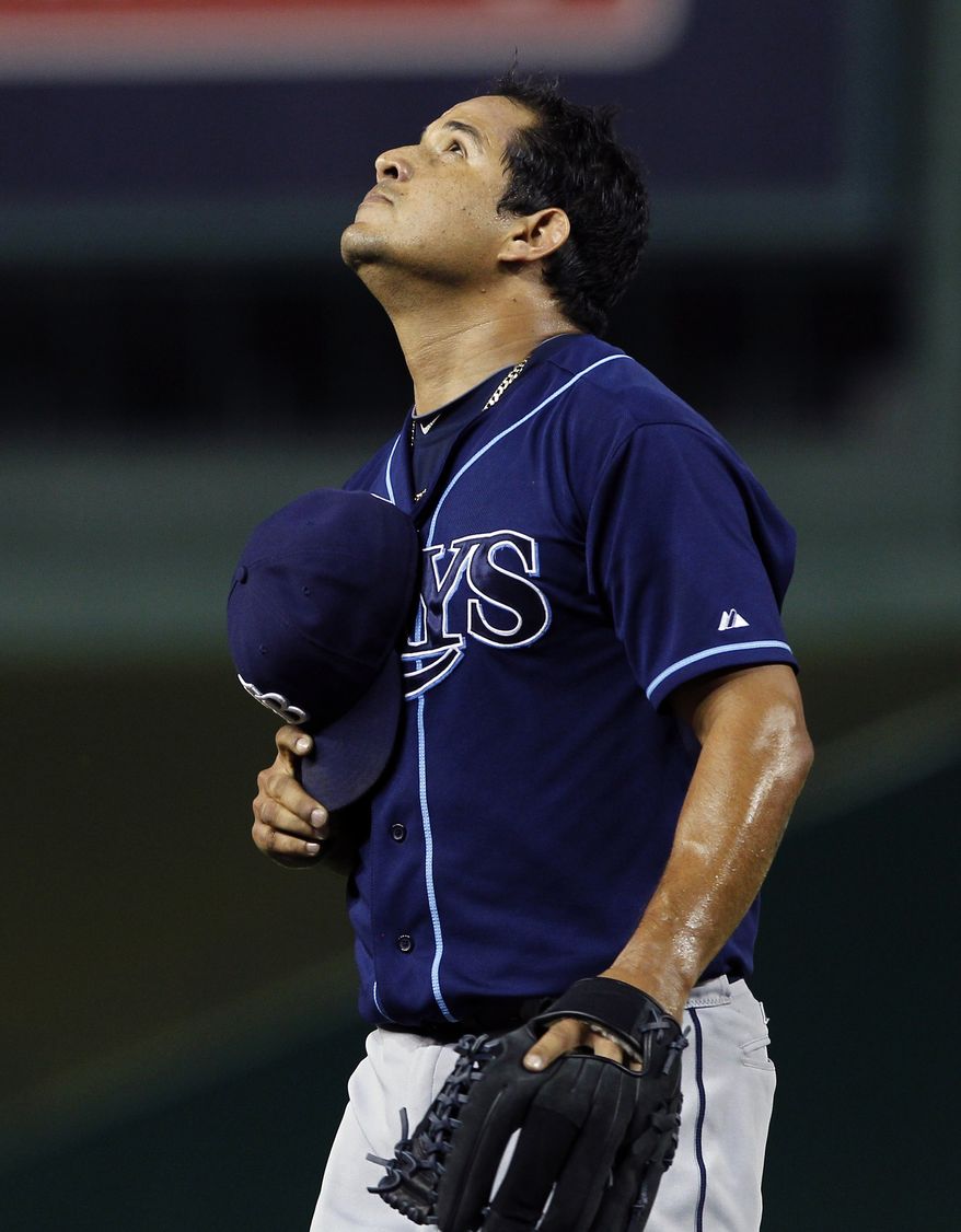 Tampa Bay Rays reliever Joel Peralta reacts as he comes off the field after pitching during the eighth inning against the Washington Nationals on Wednesday, June 20, 2012, in Washington. The Nationals won 3-2. (AP Photo/Alex Brandon)