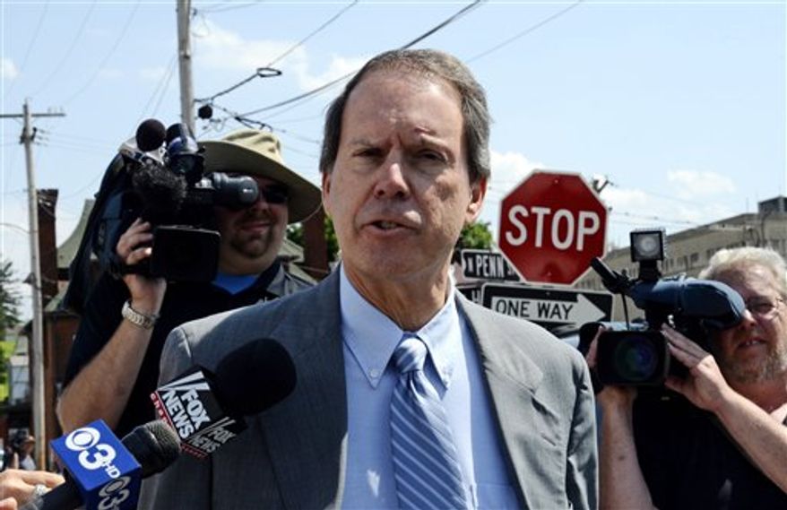 Joe Amendola, an attorney for Jerry Sandusky, leaves the Centre County courthouse after a pretrial hearing in Sandusky's child sexual abuse case in Bellefonte, Pa., on Wednesday, May 30, 2012. Sandusky lost another bid to delay his trial on Wednesday and, in what could be the last pretrial hearing before jury selection begins next week, the presiding judge heard defense lawyers and prosecutors debate whether charges should be thrown out. (AP Photo/Ralph Wilson)