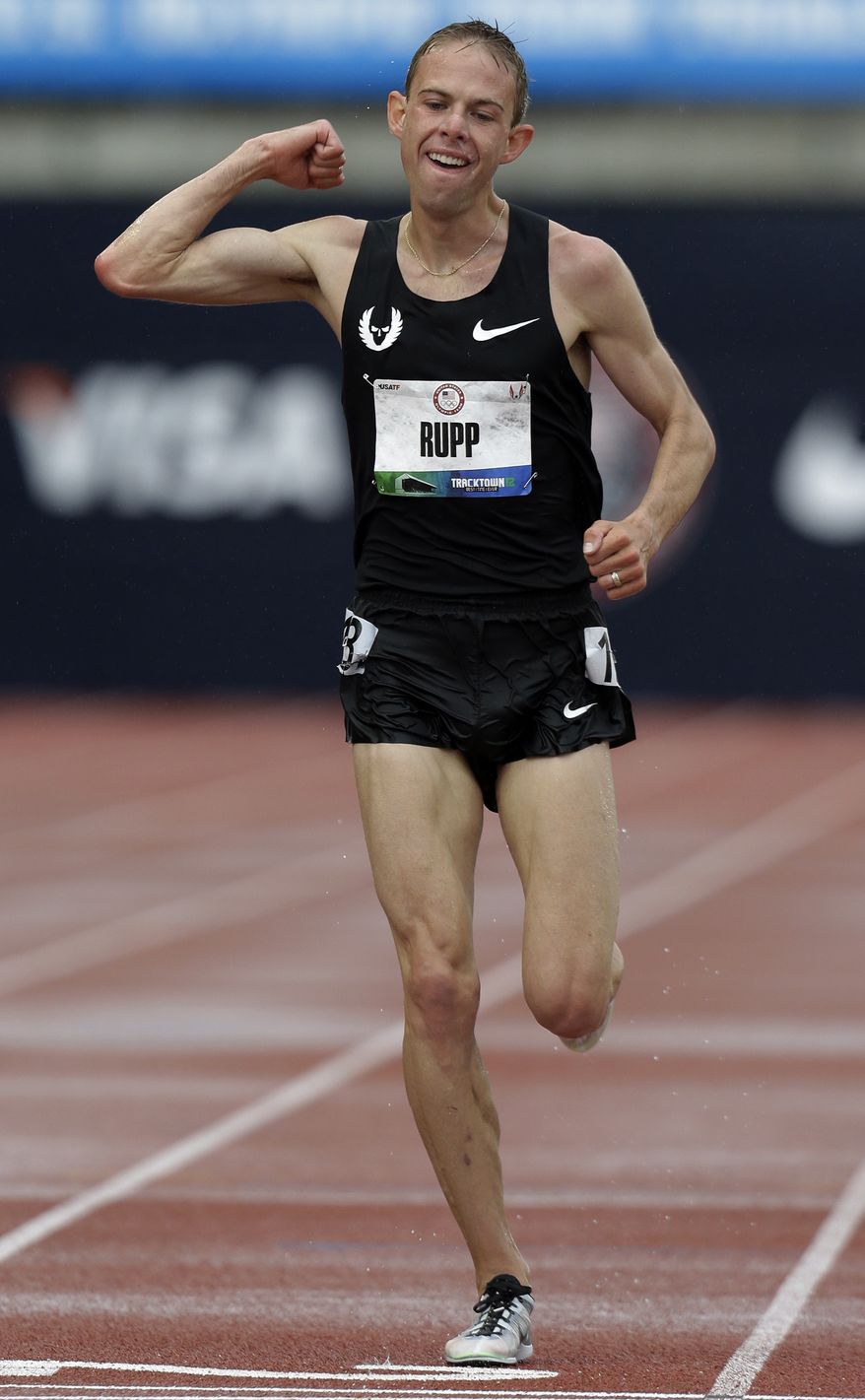 Galen Rupp reacts after finishing the men's 10,000m finals at the U.S. Olympic Track and Field Trials on Friday, June 22, 2012, in Eugene, Ore. Rupp finished first, Matt Tegenkapm second and Dathan Ritzenhein third. The three will represent the U.S. in the London Olympics. (AP Photo/Eric Gay)