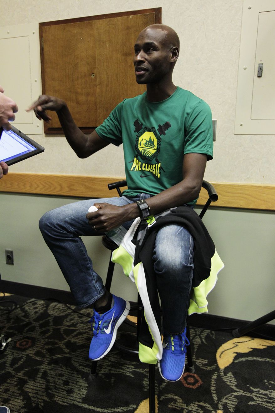 United States' Bernard Lagat talks to reporters June 1, 2012, the day before the Prefontaine Classic athletics meet in Eugene, Ore. (Associated Press)