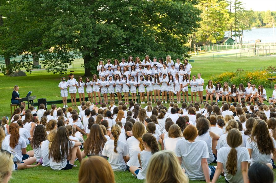 ** FILE ** This undated image released by Tripp Lake Camp shows girls wearing all white at Tripp Lake Camp in Armonk, N.Y. (Associated Press/Tripp Lake Camp)