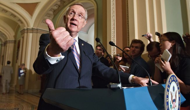 ** FILE ** Senate Majority Leader Harry Reid of Nevada speaks on Capitol Hill on Tuesday, June 26, 2012, after the Democrats&#x27; weekly strategy session. (Associated Press)
