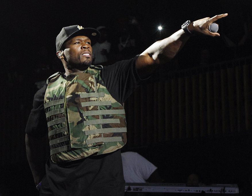 **FILE** Rapper 50 Cent, also known as Curtis Jackson, performs March 19, 2012, during the Fuse Live: Shady 2.0 SXSW concert at the Austin Music Hall in Austin, Texas. (Associated Press/Fuse, Brandon Wade)