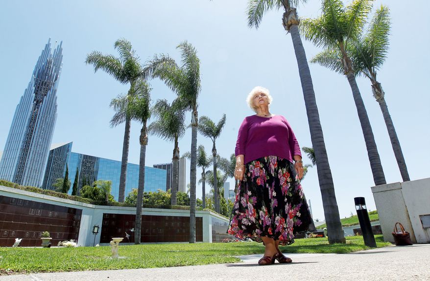 ASSOCIATED PRESS
Dolores Rommel was a member of the Crystal Cathedral for years. Her husband is buried in a vault on church grounds and she will be buried there as well. Neither expected the church and cemetery would be sold to the Catholic Church.