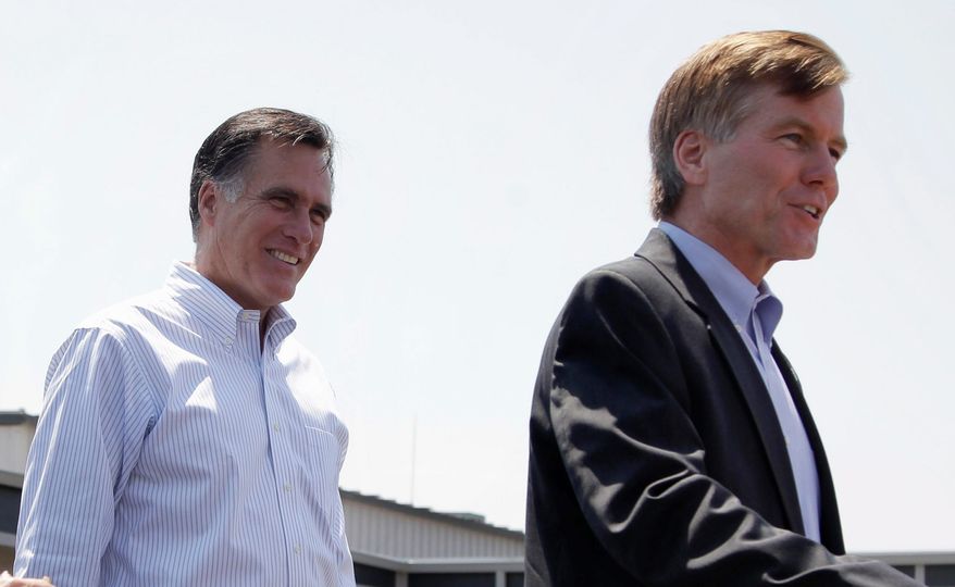 Republican presidential candidate Mitt Romney (left) listens in May as Virginia Gov. Bob McDonnell speaks on his behalf in Portsmouth, Va. Mr. McDonnell recently hinted that he is being vetted as a possible running mate on the GOP ticket. Previously, he had denied that he was under consideration for the vice-presidential spot. (Associated Press)