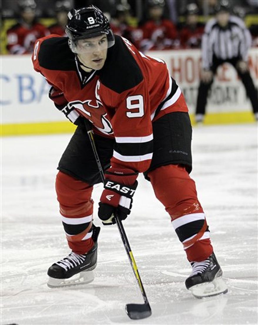 Forward Zach Parise will be the most coveted free agent once the market opens July 1. (AP Photo/Julio Cortez)