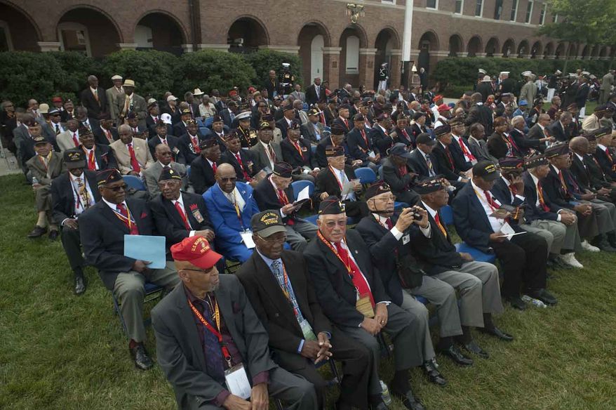 Four hundred and forty retired Marines received the Congressional Gold Medal for their military service during the Montford Pointe Marines Parade at the Marine Barracks Washington on Thursday, June 28, 2012, in Washington D.C. Approximately 20,000 African American Marine recruits where trained at Montford Pointe when the military was still segregated. (Raymond Thompson/The Washington Times)