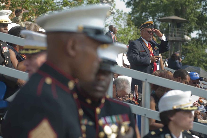 Four hundred and forty retired Marines received the Congressional Gold Medal for their military service during the Montford Pointe Marines Parade at the Marine Barracks Washington on Thursday, June 28, 2012, in Washington D.C. Approximately 20,000 African American Marine recruits where trained at Montford Pointe when the military was still segregated. (Raymond Thompson/The Washington Times)