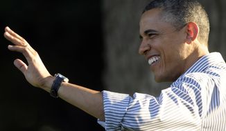 President Obama waves as he arrives to speak at a congressional picnic on the South Lawn of the White House on Wednesday, June 27, 2012. (Associated Press)