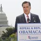 With the U.S. Capitol in the background, Republican presidential candidate and former Massachusetts Gov. Mitt Romney speaks about the Supreme Court&#x27;s health care ruling on June 28, 2012. (Associated Press)