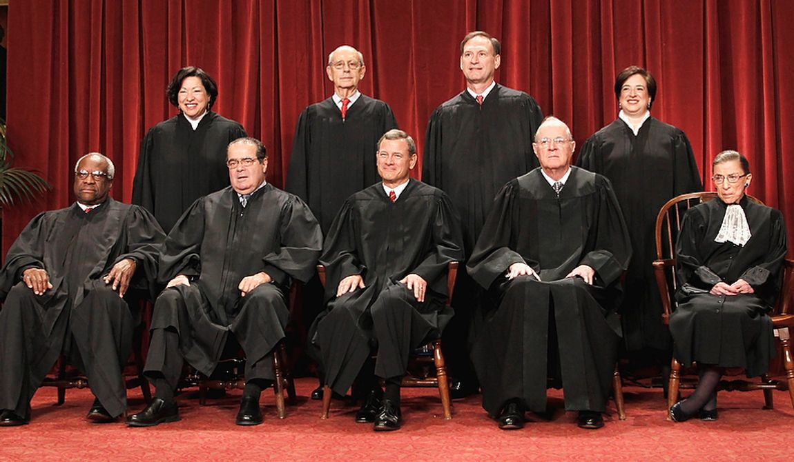 FILE - This Oct. 8, 2010 file photo shows the justices of the U.S. Supreme Court at the Supreme Court in Washington. Seated from left are Associate Justices Clarence Thomas, and Antonin Scalia, Chief Justice John Roberts, Associate Justices Anthony M. Kennedy and Ruth Bader Ginsburg. Standing, from left are Associate Justices Sonia Sotomayor, Stephen Breyer, Samuel Alito Jr., and Elena Kagan.  The Supreme Court on Thursday, June 28, 2012, upheld the individual insurance requirement at the heart of President Barack Obama&#x27;s historic health care overhaul. (AP Photo/Pablo Martinez Monsivais, File)