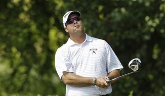 Chris Couch, shown during the Byron Nelson Championship, said Friday&#x27;s Round 2 at the AT&amp;T National was one of the hottest rounds he&#x27;s every played, as temperatures reached triple digits at Bethesda&#x27;s Congressional Country Club. (AP Photo/LM Otero)