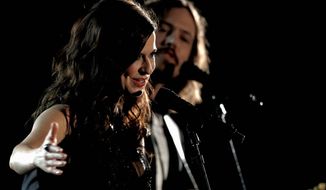 Joy Williams, left, and John Paul White, of musical group The Civil Wars, perform during the 54th annual Grammy Awards on Sunday, Feb. 12, 2012 in Los Angeles. (AP Photo/Matt Sayles)
