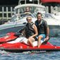 Republican presidential hopeful Mitt Romney and wife Ann enjoy a break from the campaign trail near the family compound on Lake Winnipesaukee in Wolfeboro, N.H., on Monday. (Associated Press)