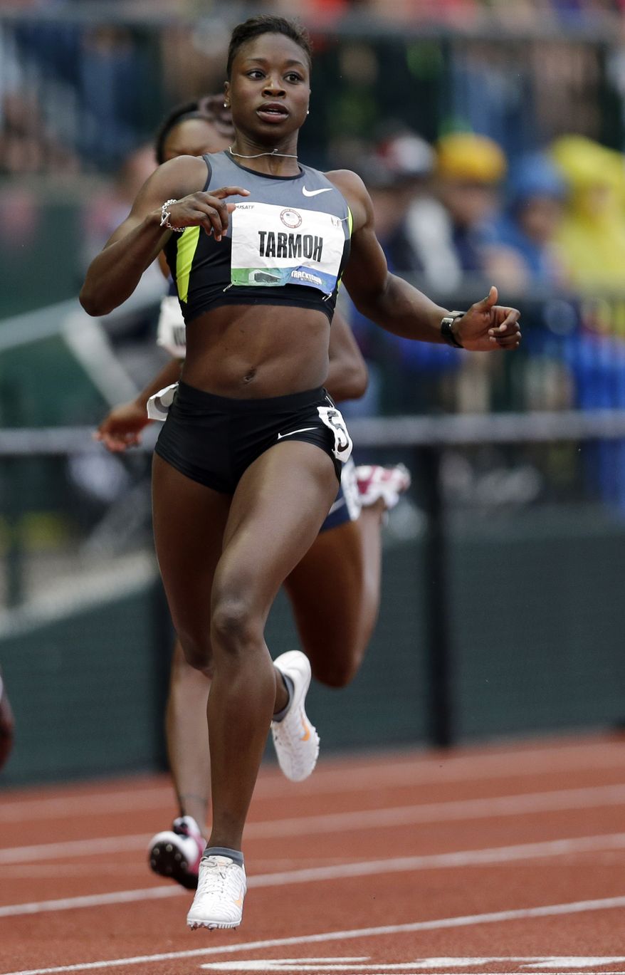 **FILE** Jeneba Tarmoh finishes first in her heat in the women's 200 meters at the U.S. Olympic track and field trials in Eugene, Ore., on June 28, 2012. (Associated Press)