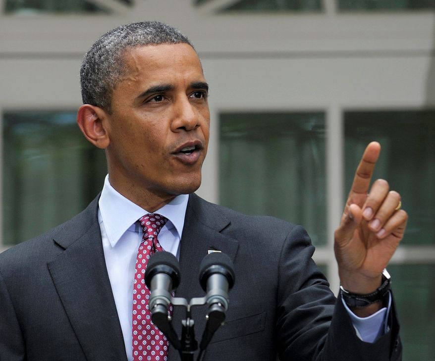 President Obama's re-election campaign has rolled out ads criticizing Mitt Romney for sending jobs overseas while at Bain Capital. (Associated Press)