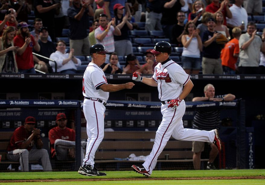 Forty-year-old Chipper Jones was named to the All-Star team as an injury replacement for Matt Kemp. Now, he has a chance to play with a young prodigy just like he was in Bryce Harper, if the rookie wins the final-spot vote. (Associated Press)