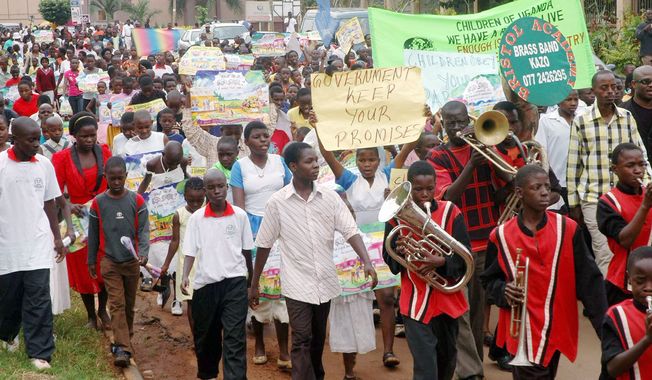 Thousands of youths demonstrate against homosexuality in Uganda&#x27;s capital, Kampala, in January 2010. Ugandan Ethics and Integrity Minister Simon Lokodo has accused some nongovernmental organizations of conspiring with foreign backers to recruit children into homosexuality. (Associated Press)