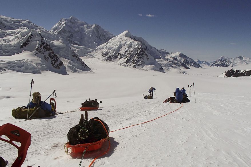 Members of Warfighter Sports Denali Challenge pull gear June 13, 2012, while attempting to climb Mount McKinley in Alaska. The five men, all severely wounded in war, including four who had amputations, had to abandon their climb of North America's tallest peak because of weather. (Associated Press/Disabled Sports USA)