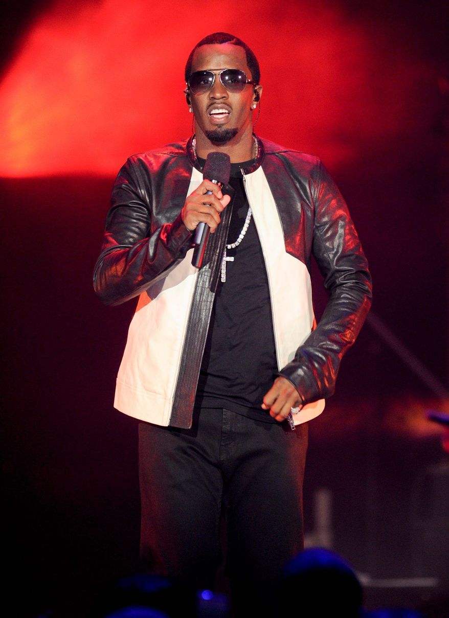 Hip-hop entrepreneur Sean "P. Diddy" Combs' home was broken into by Quamine Taylor, who was sentenced Thursday to time served for the offense. (Associated Press)