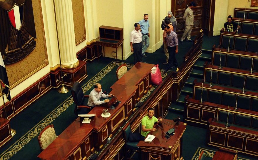 Officials are seen July 9, 2012, in the Egyptian parliament in Cairo. (Associated Press)