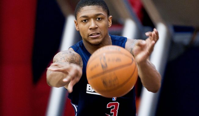 Wizards rookie Bradley Beal averaged 14.8 points in his only season at Florida. As the shooting guard, he&#x27;s expected to run the floor with point guard John Wall. Beal received a taste of the NBA game during minicamp at Verizon Center (below). (Ryan M.L. Young/The Washington Times)