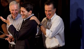 **FILE** Republican presidential candidate Mitt Romney (right) shares a laugh April 1, 2012, with Rep. Paul Ryan (center), Wisconsin Republican, and Sen. Ron Johnson, Wisconsin Republican, during a campaign event in Milwaukee. (Associated Press)