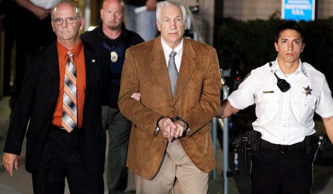 Former Penn State assistant football coach Jerry Sandusky faces 442 years in prison for abusing boys. A state-funded investigation found that his bosses wilfully didn&#x27;t report what they knew about his behavior to authorities. (Associated Press)