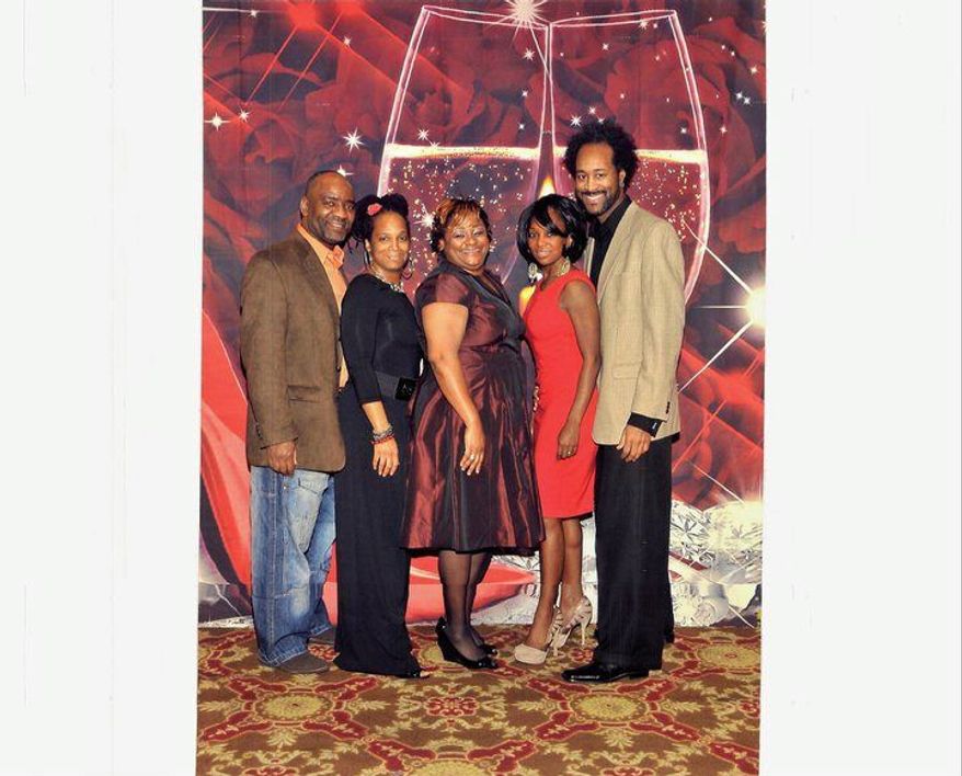 Cedric Crawley, left, a vice chairman of the FOP unit representing youth corrections officers, tried to unseat the chairwoman, Takisha Brown, who has accused him of bank fraud. He is seen here with his wife, Denise Crawley, second from left, and Ms. Brown's predecessor, Tasha Williams, center. Ms. Crawley is a paralegal for the union's former attorney, Ardra O'Neal, second from right, who now represents Mr. Crawley personally.