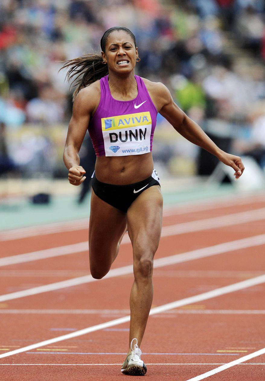 FILE - In this Aug. 14, 2010, file photo, Debbie Dunn, of the United States, competes in the women's 400 meters during a Diamond League Athletics meeting at Crystal Palace in London. Dunn took her name off the U.S. Olympic team roster Friday, July 13, 2012, after testing positive for excessive testosterone. Dunn, who finished fourth in the 400 meters at Olympic trials, was selected for the American relay pool. She is the 2010 world indoor champion at 400 meters and would have been a likely candidate to run in the Olympic 1,600-meter relay, which the American women have won every year since 1996. (AP Photo/Tom Hevezi, File)